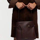Mini Tote du Jour Deep Brown Calf Skin with a model