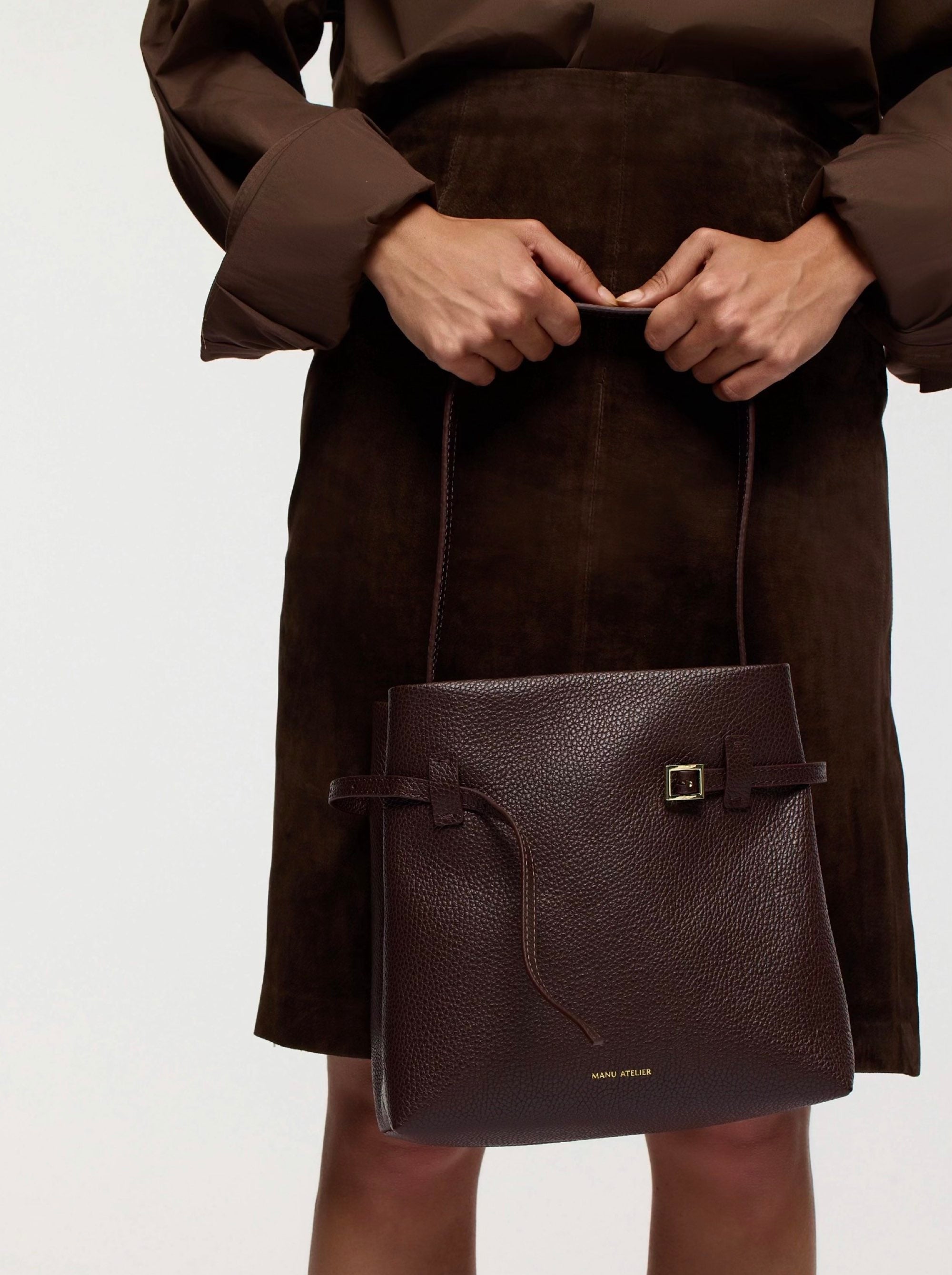 Mini Tote du Jour Deep Brown Calf Skin with a model